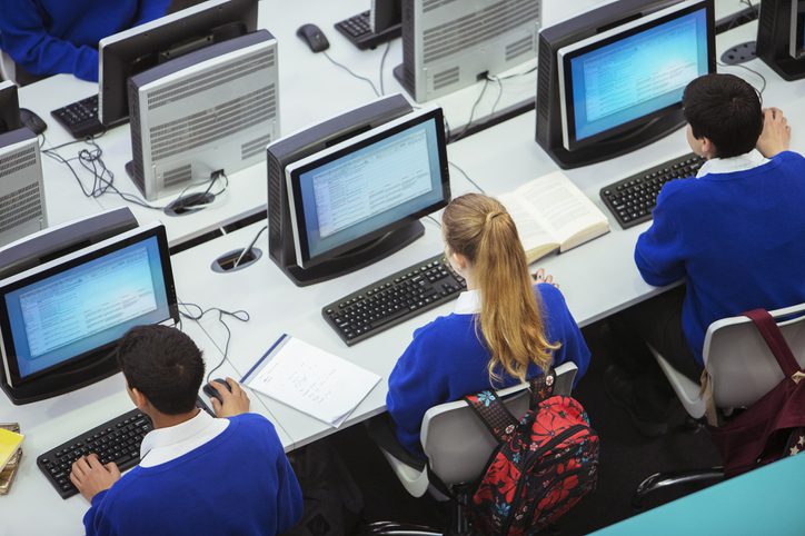 Group of people looking at the computer