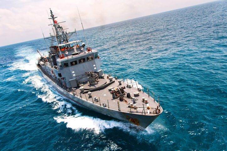 Grey modern ship sailing in the sea